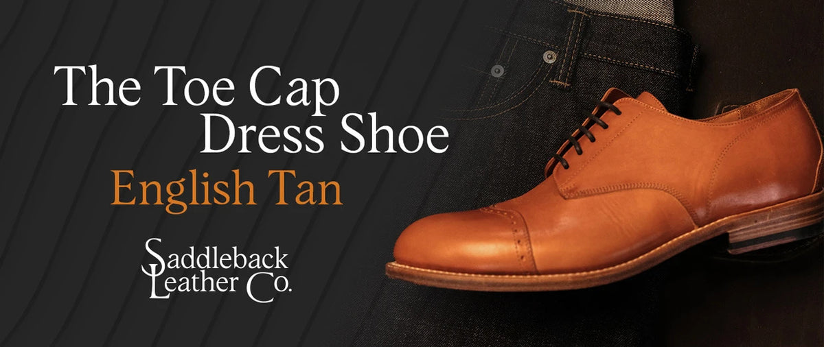 Toe Cap Shoes - English Tan side profile on denim and dark stripes, banner text The Toe Cap Dress Shoe English Tan