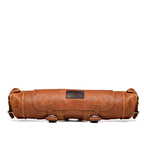 Large Travel Backpack in Bacon, rolled up flat for storage, side view