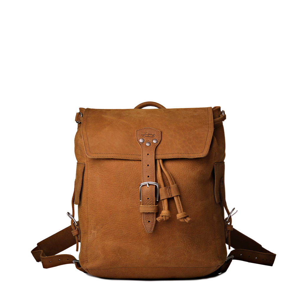 16" Drawstring Backpack in Tobacco, front view with buckled flap, drawstring ties and side pockets