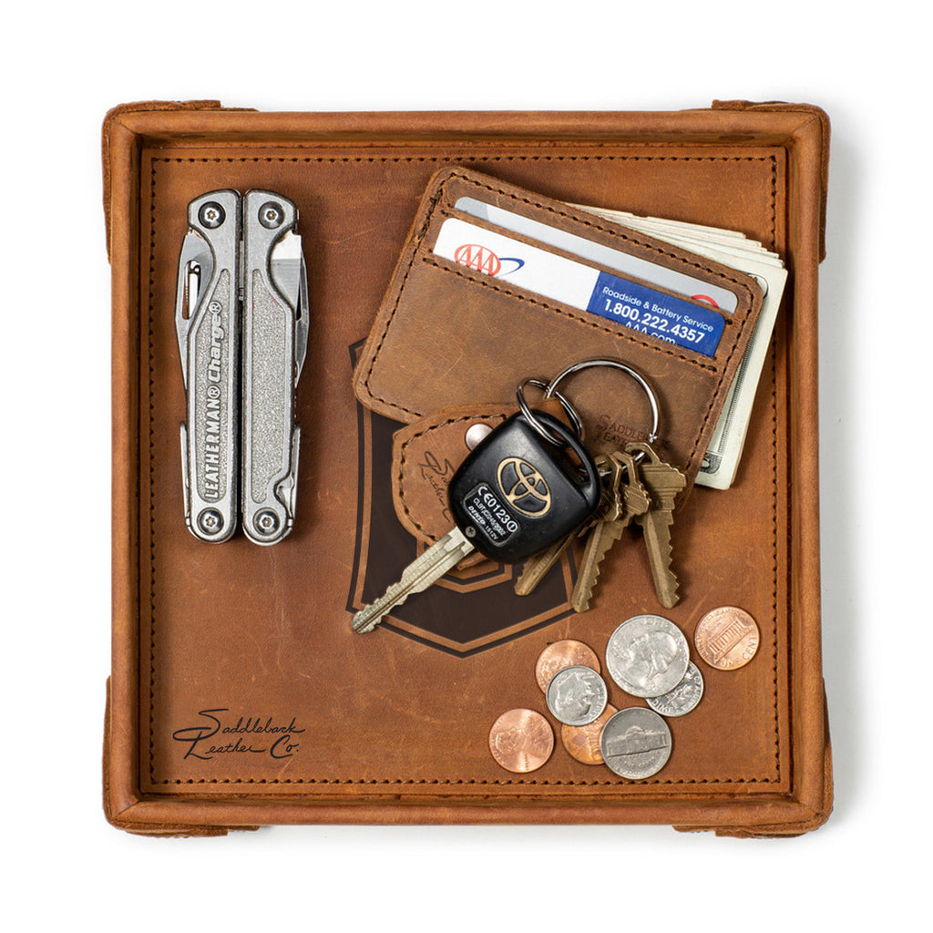 Cleveland Guardians Leather Valet Tray in Tobacco, top-down view holding a multi-tool, card wallet, keys and coins