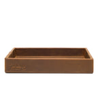 The Simple Leather Valet Tray in Tobacco, straight-on side view showing embossed Saddleback Leather Co. logo