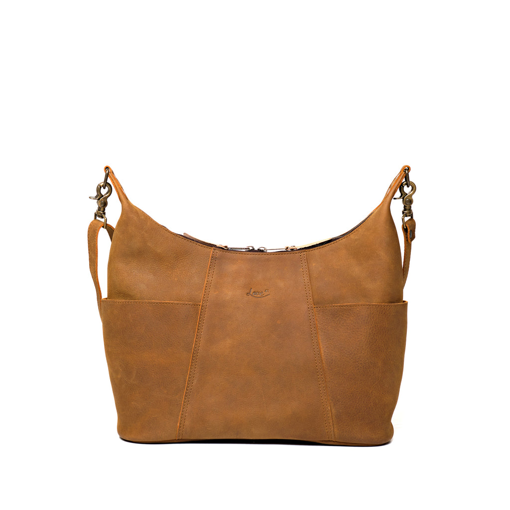 Women's Hobo Organizer Bag in Tobacco, front view with exterior pockets and embossed logo